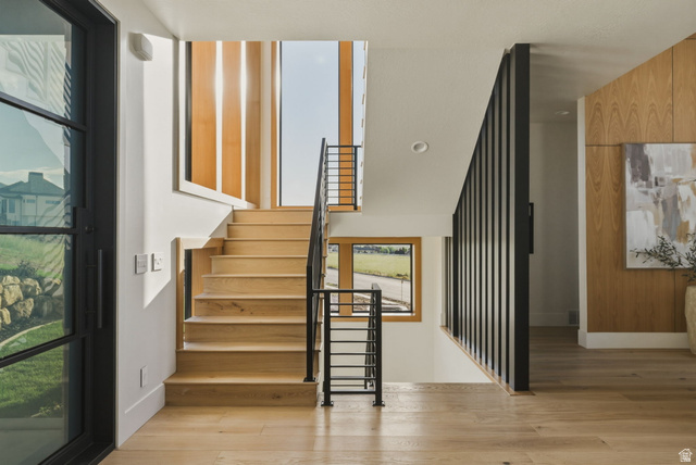 923 North Emery Lane Elk Ridge, UT 84651 - Photo 35 of 101 Light wood-finish staircase with black metal railings