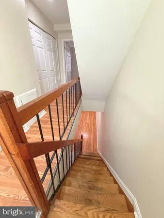 a view of entryway with wooden floor