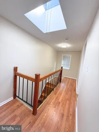 a view of a house with snow on the road