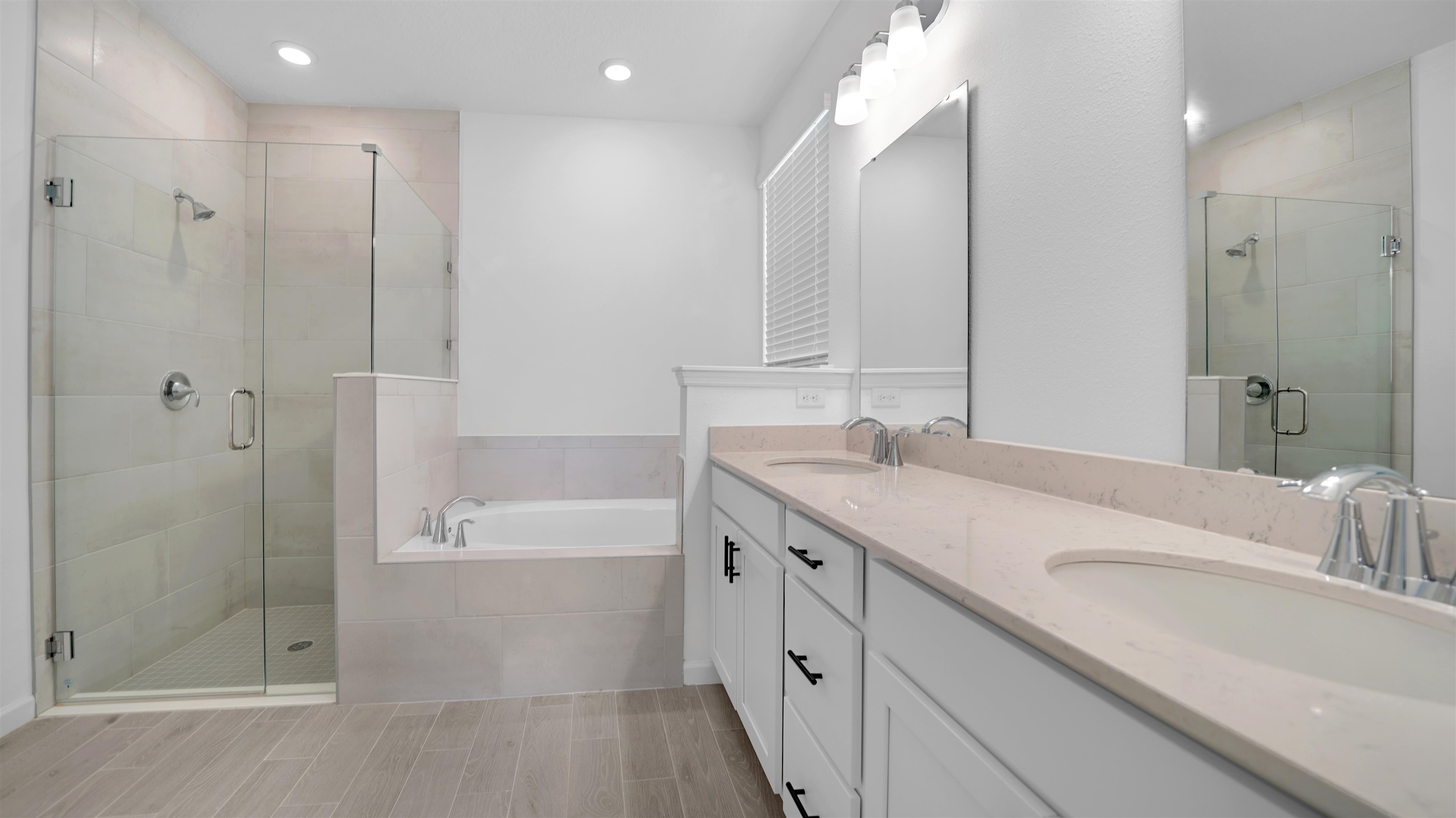 264 Lake Sinclair Street St. Augustine, FL 32084 - Photo 19 of 40 a bathroom with a granite countertop sink mirror and shower