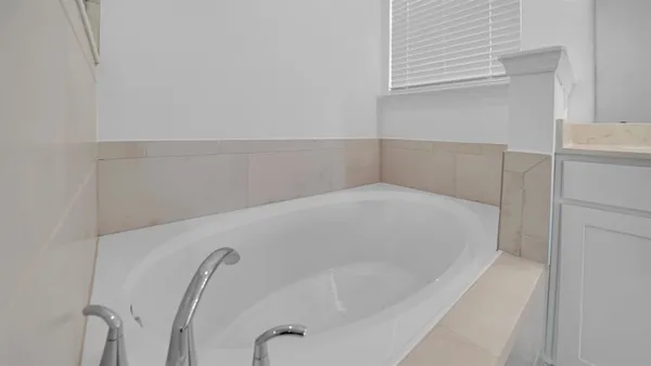 a bathroom with a bathtub