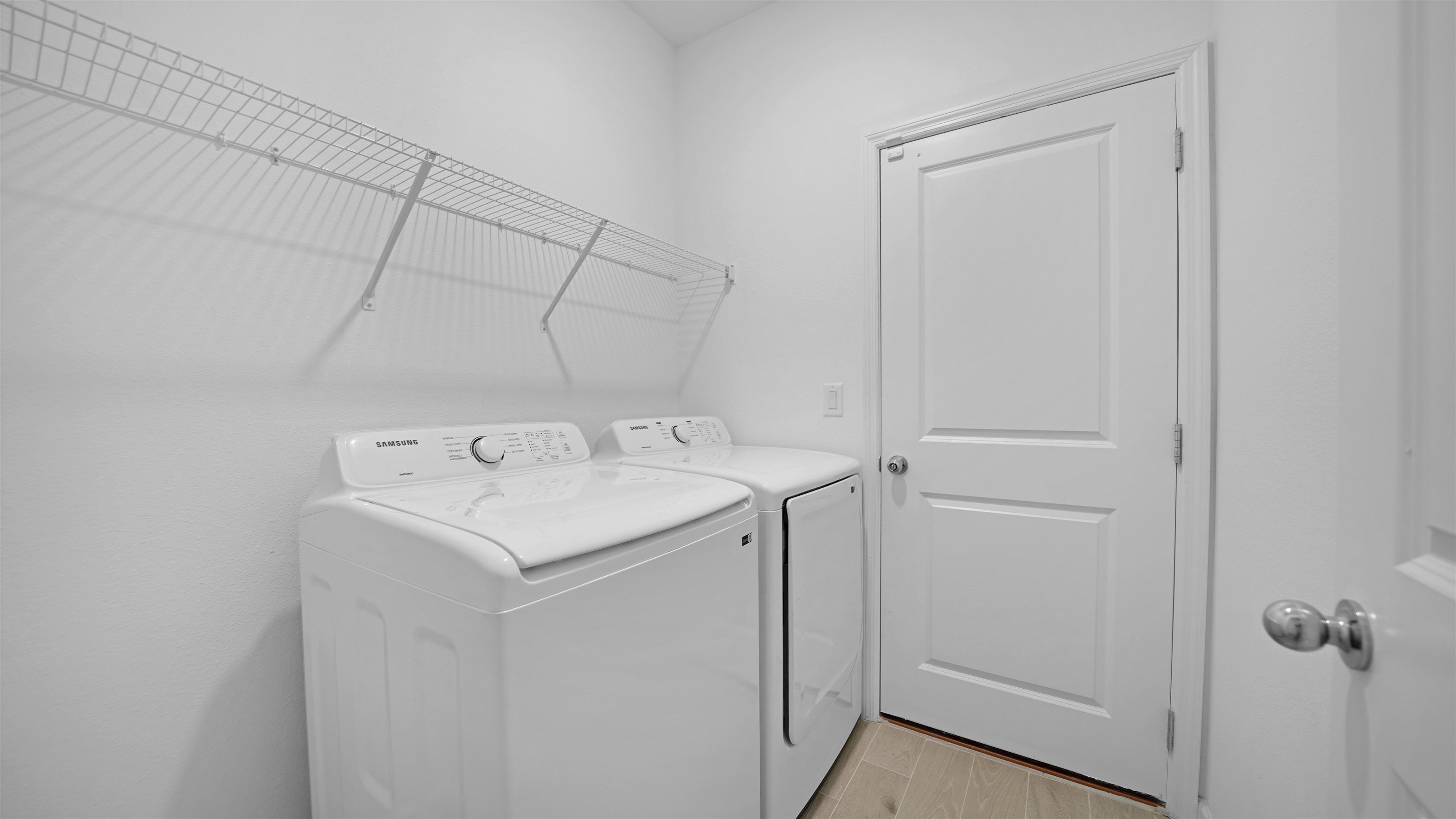 264 Lake Sinclair Street St. Augustine, FL 32084 - Photo 27 of 40 a utility room with dryer and washer