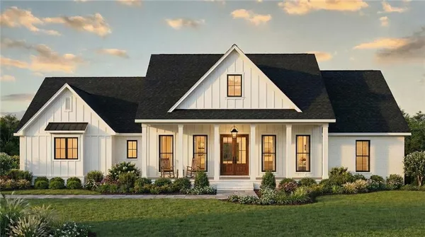 front view of a house with a yard