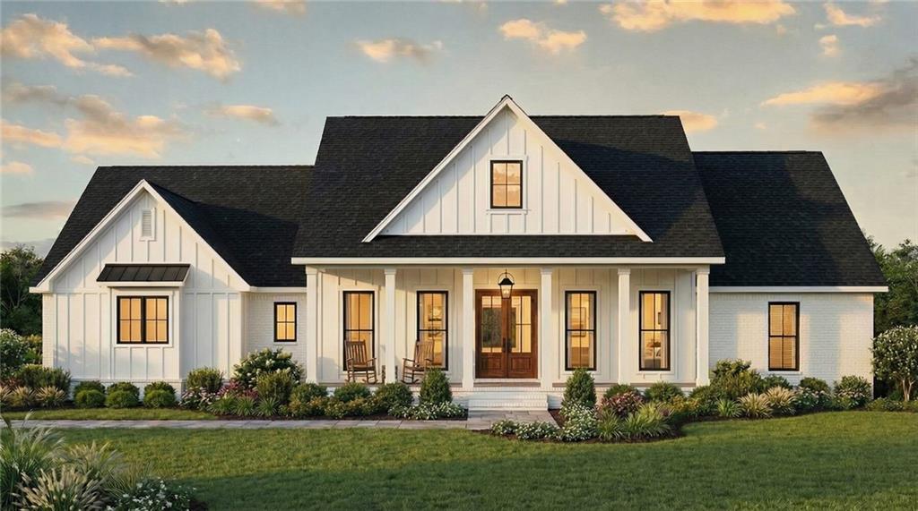 front view of a house with a yard