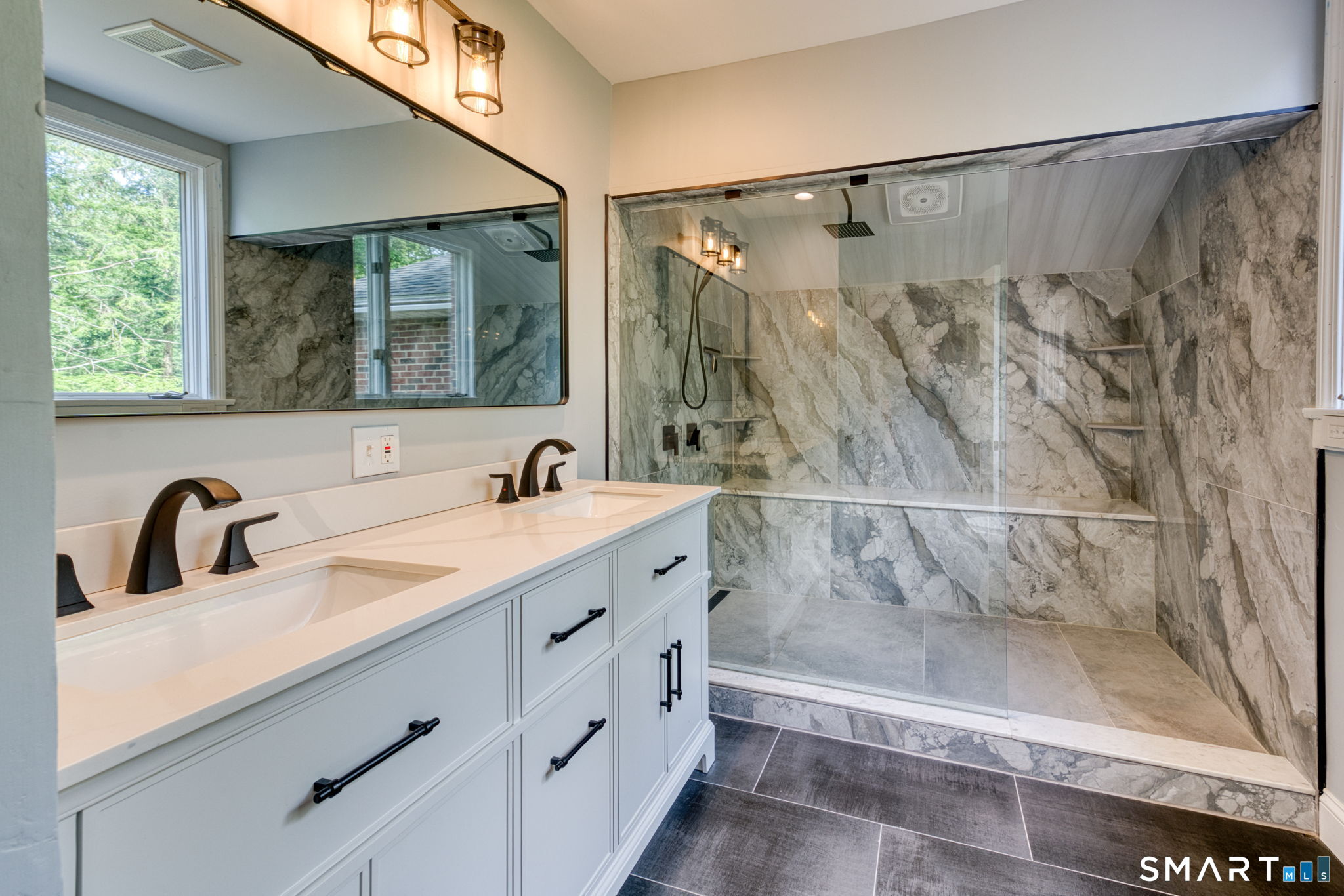 1010 Strong Road South Windsor, CT 06074 - Photo 29 of 40 Primary full bath with two shower heads, double sink and beautiful tile.