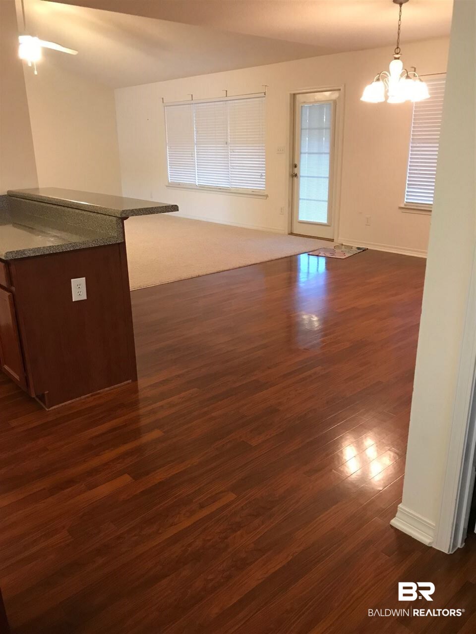 335 Manchester Lane Foley, AL 36535 - Photo 13 of 33 Shows bar, dining areas access to screened Porch