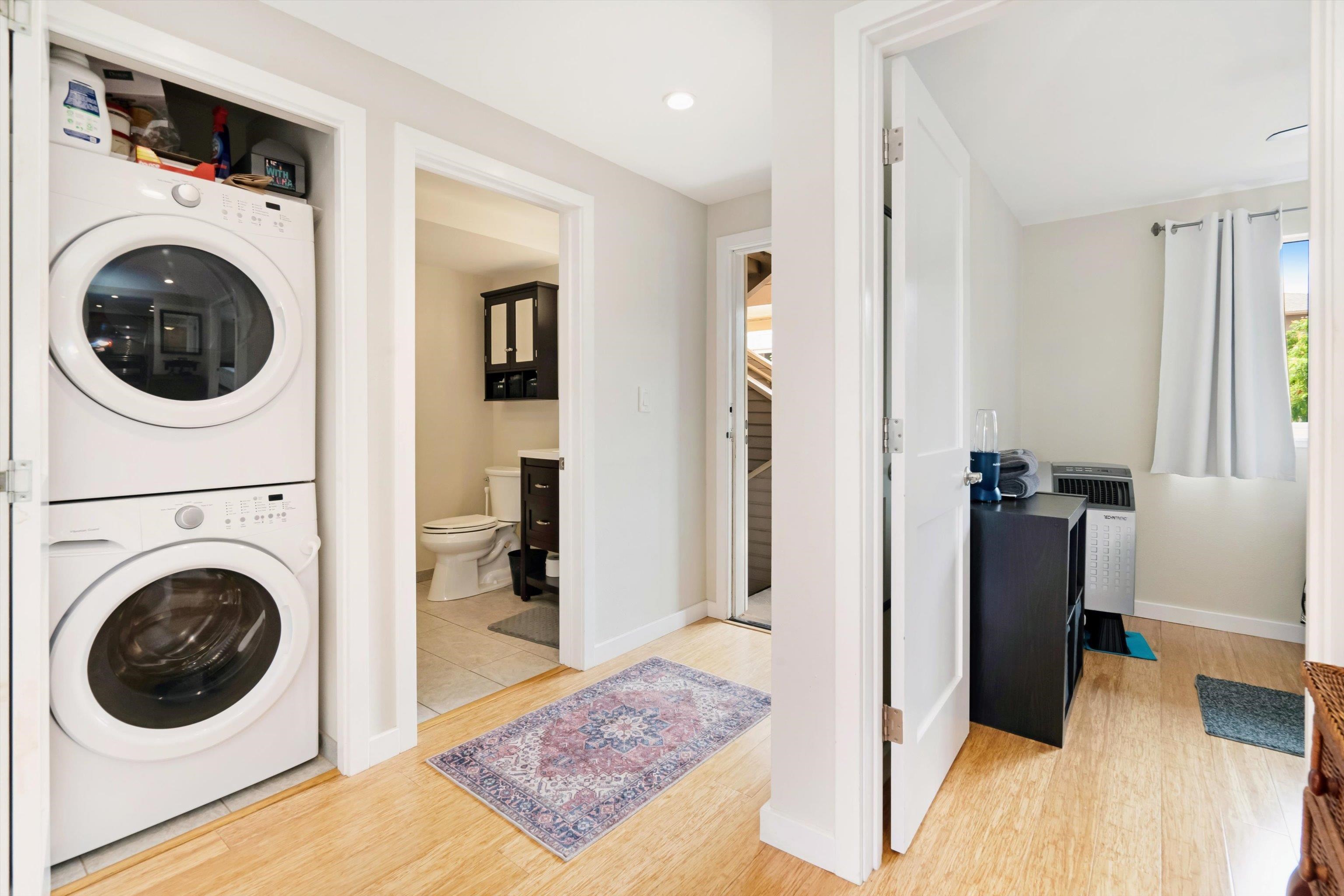 2747 South Kihei Road, Unit B203 Kihei, HI 96753 - Photo 11 of 44 a view of a hallway with washer and dryer