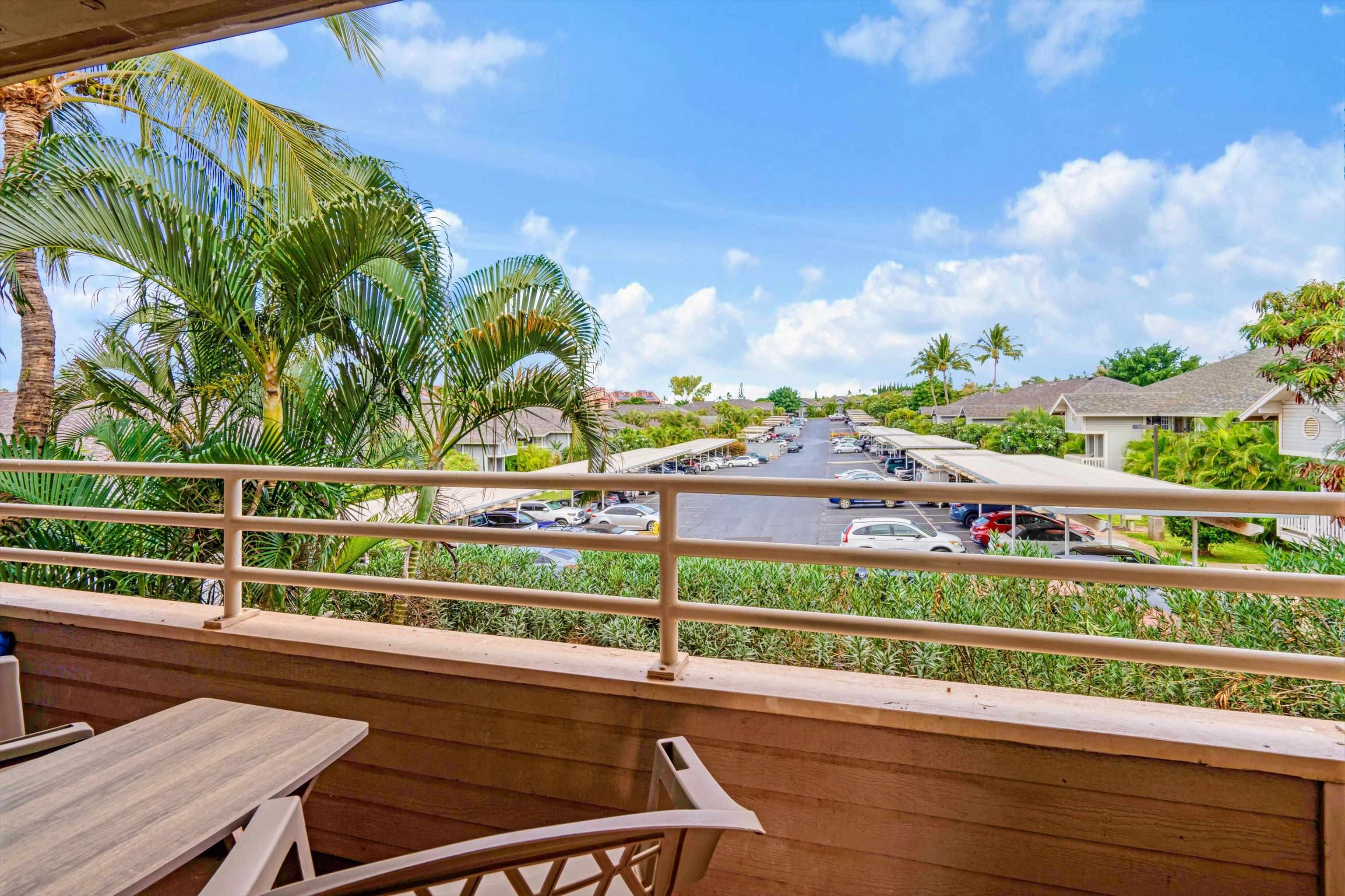 2747 South Kihei Road, Unit B203 Kihei, HI 96753 - Photo 17 of 44 a view of a chairs and table in the terrace