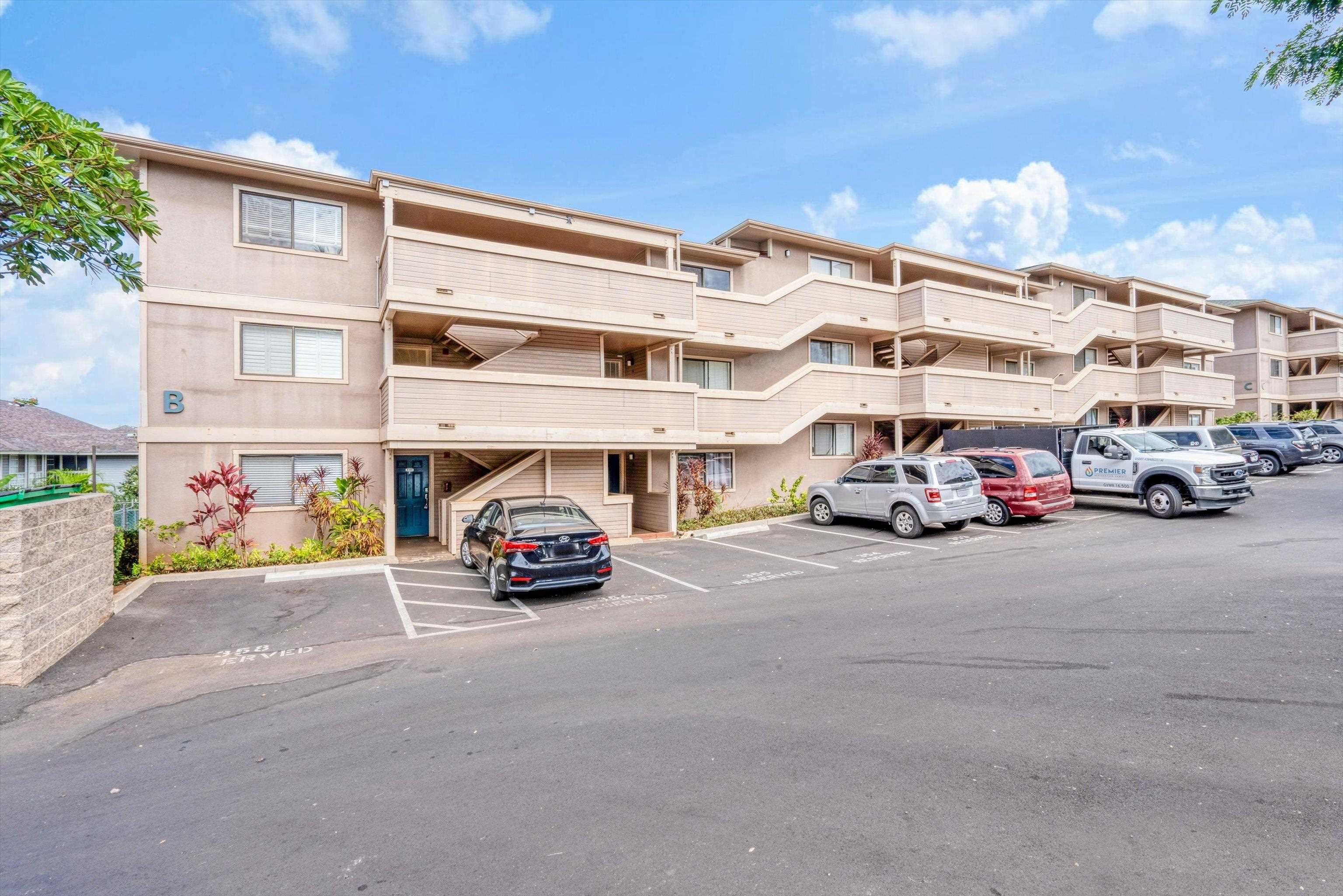 2747 South Kihei Road, Unit B203 Kihei, HI 96753 - Photo 2 of 44 a car parked in front of a building