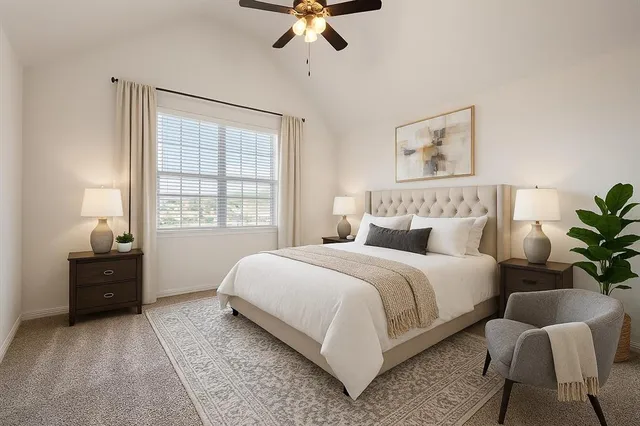 a bedroom with a bed and window