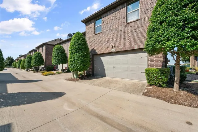 a view of a building with a street