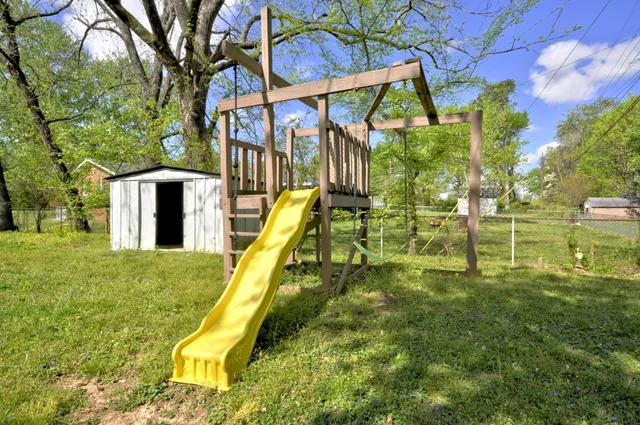 a backyard of a house with lots of green space