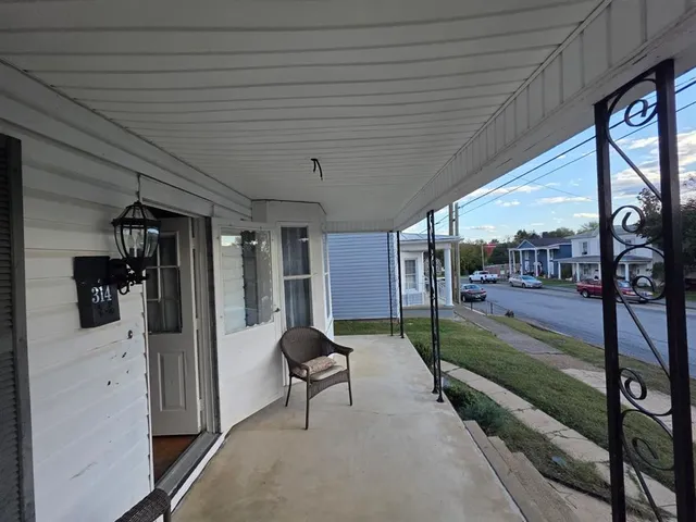a view of a porch with furniture