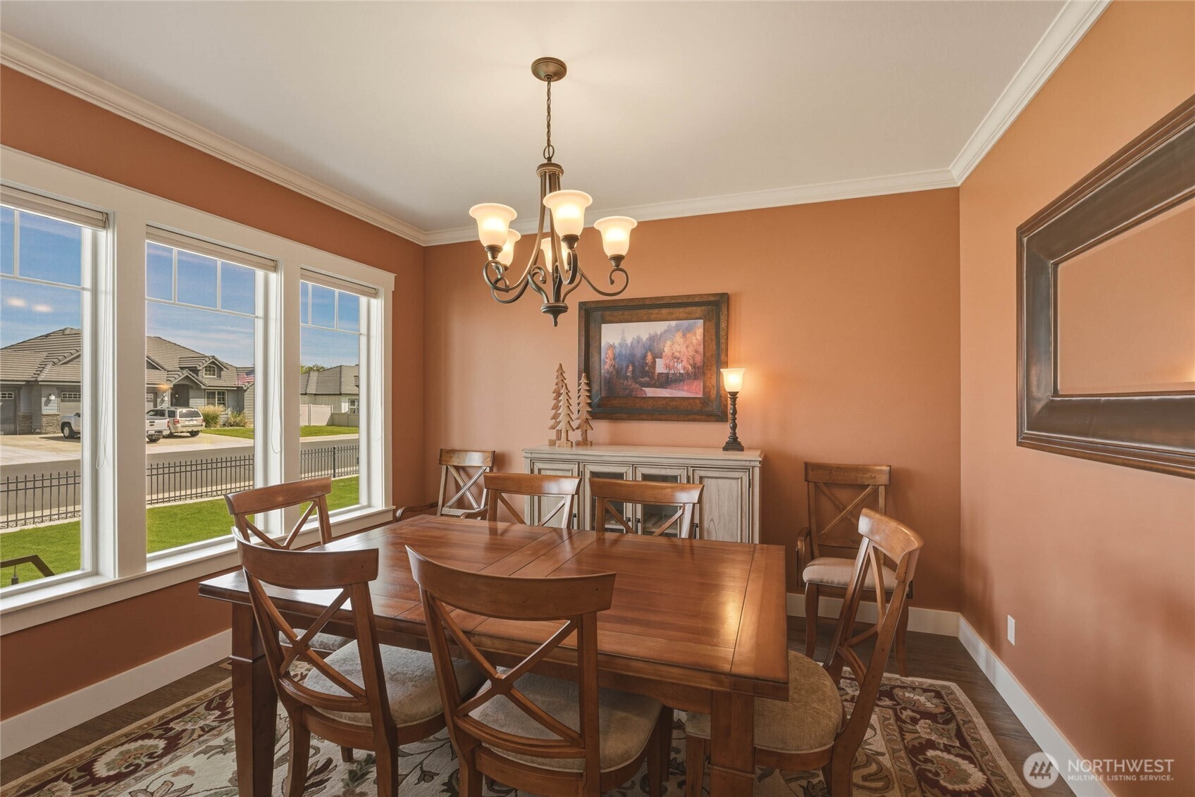 726 L Street Southwest Quincy, WA 98848 - Photo 17 of 40 a view of a dining room with furniture a chandelier and wooden floor