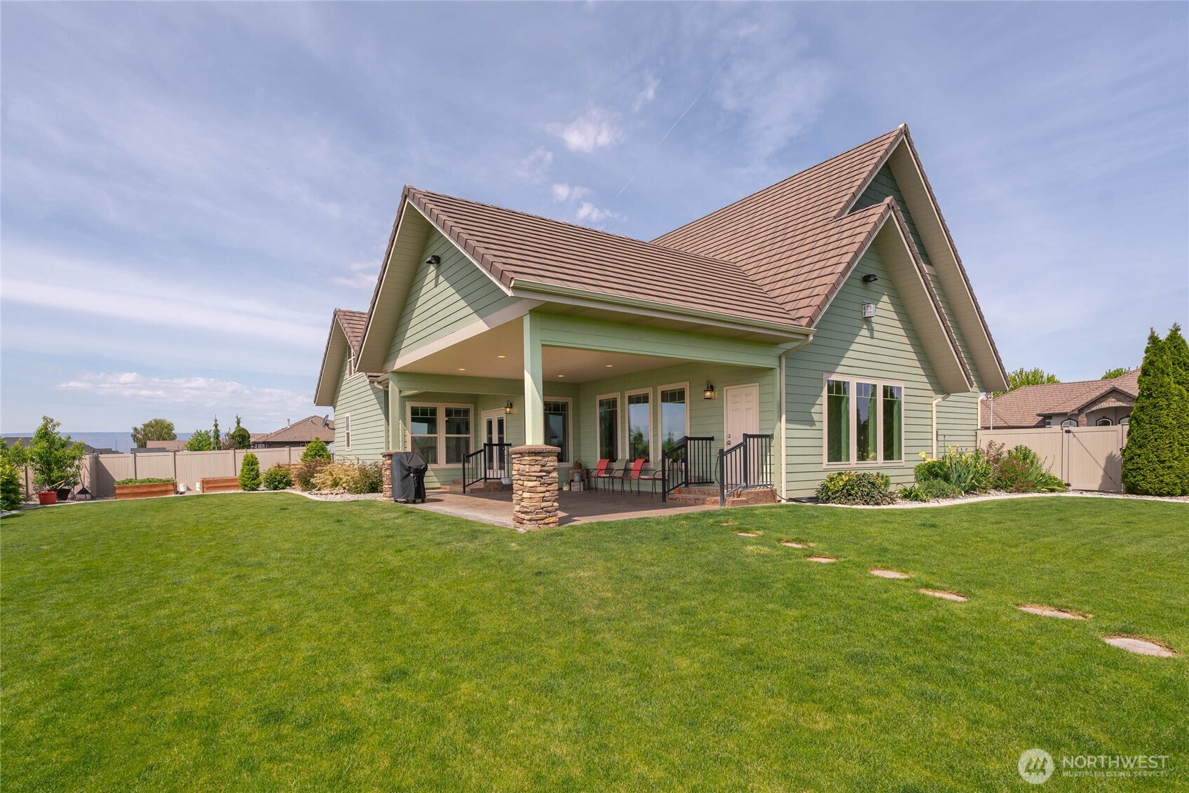 726 L Street Southwest Quincy, WA 98848 - Photo 19 of 40 a view of a house with a yard and sitting area