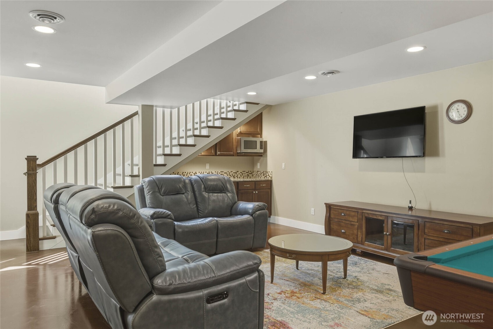 726 L Street Southwest Quincy, WA 98848 - Photo 38 of 40 a living room with furniture and a flat screen tv