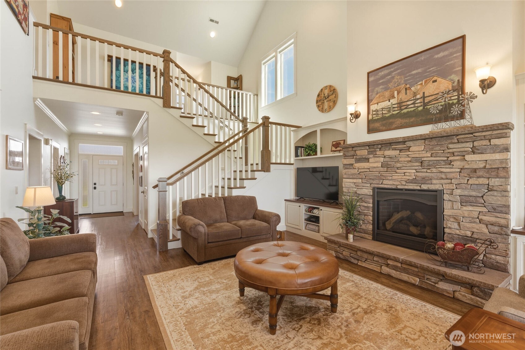 726 L Street Southwest Quincy, WA 98848 - Photo 8 of 40 a living room with furniture a rug and a fireplace