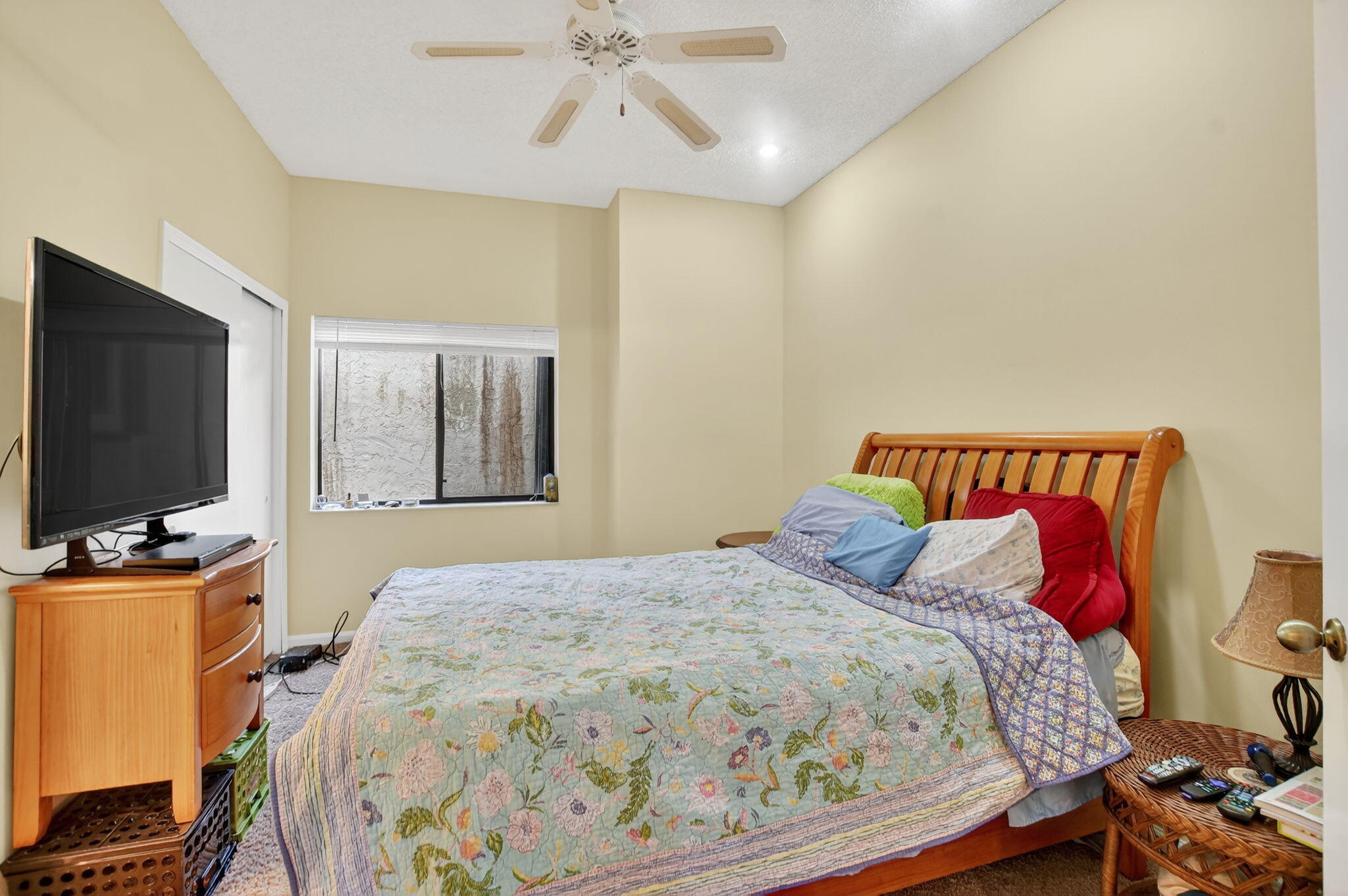 20803 Cabrillo Way Boca Raton, FL 33428 - Photo 25 of 89 a bedroom with a bed and a flat screen tv