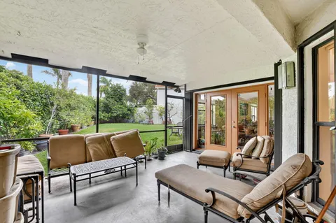 a view of livingroom with furniture and flat screen tv