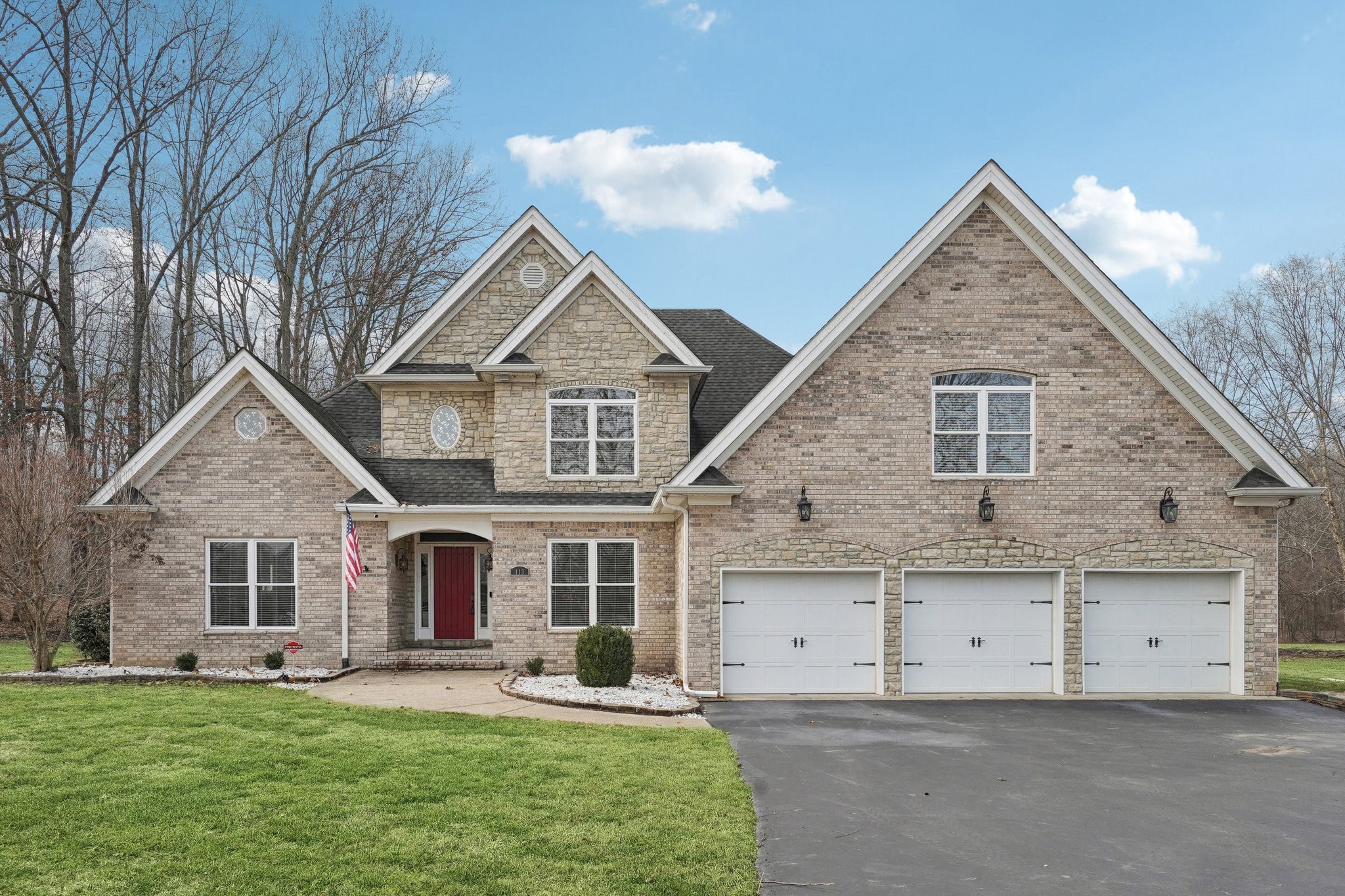 113 Timber Ridge Court Alvaton, KY 42122 - Photo 1 of 81 a view of a yard in front of a house with large windows