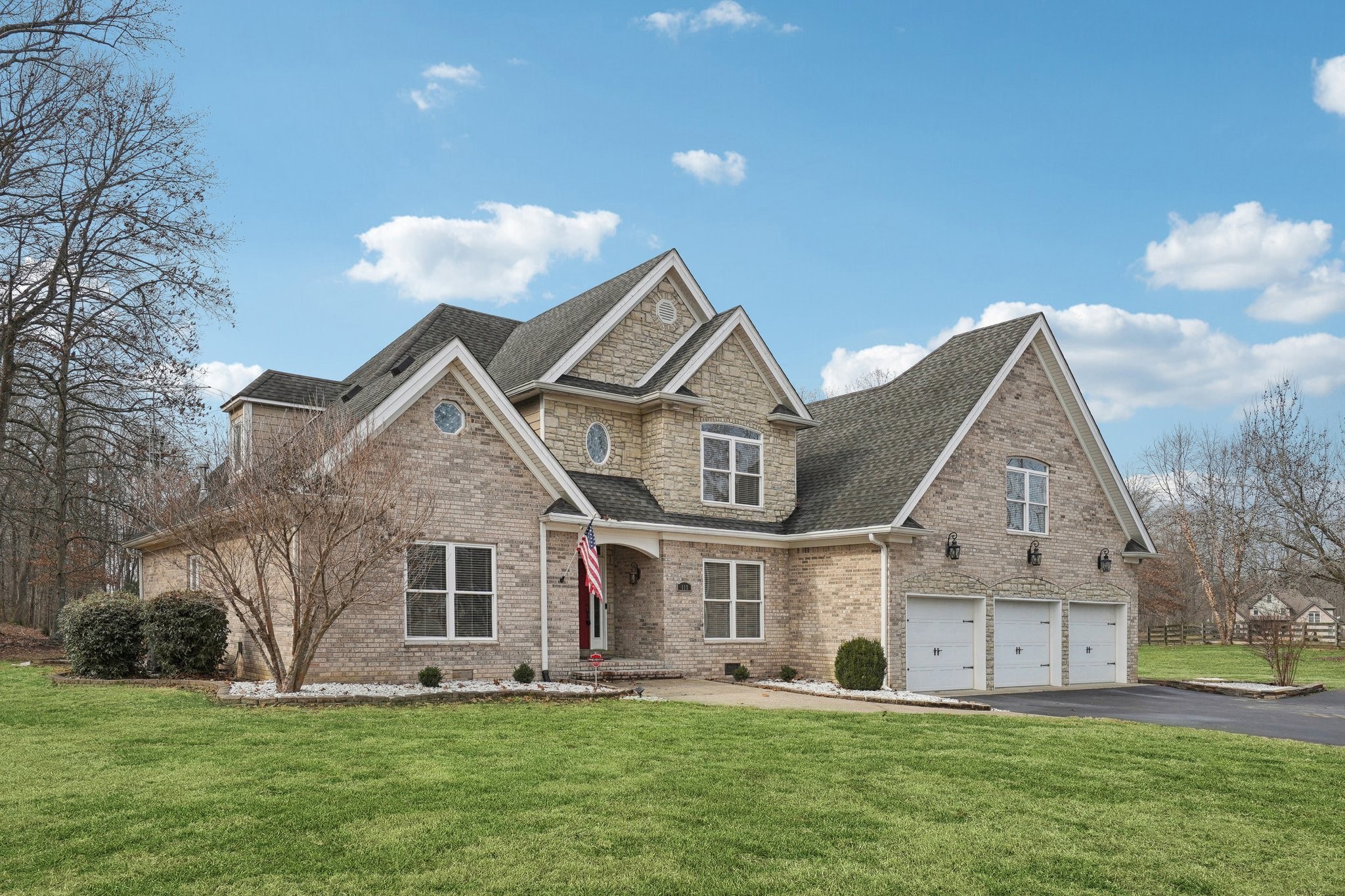113 Timber Ridge Court Alvaton, KY 42122 - Photo 4 of 81 a view of a house with a big yard and large trees