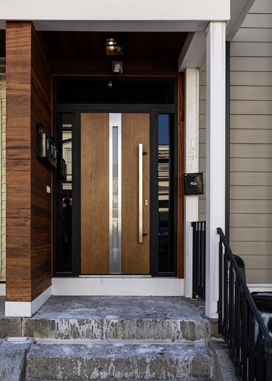 157 Princeton Street, Unit 2 Boston, MA 02128 - Photo 4 of 22 a view of entryway with a rug