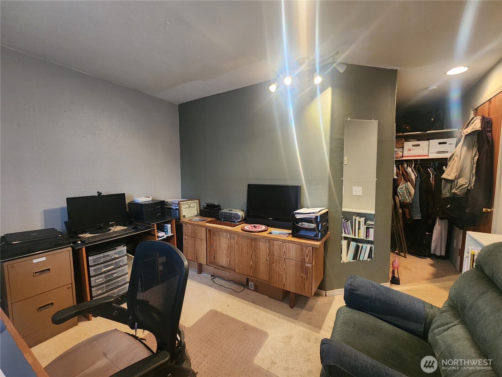 117 J Street Cosmopolis, WA 98537 - Photo 24 of 33 a livingroom with workspace and a couch