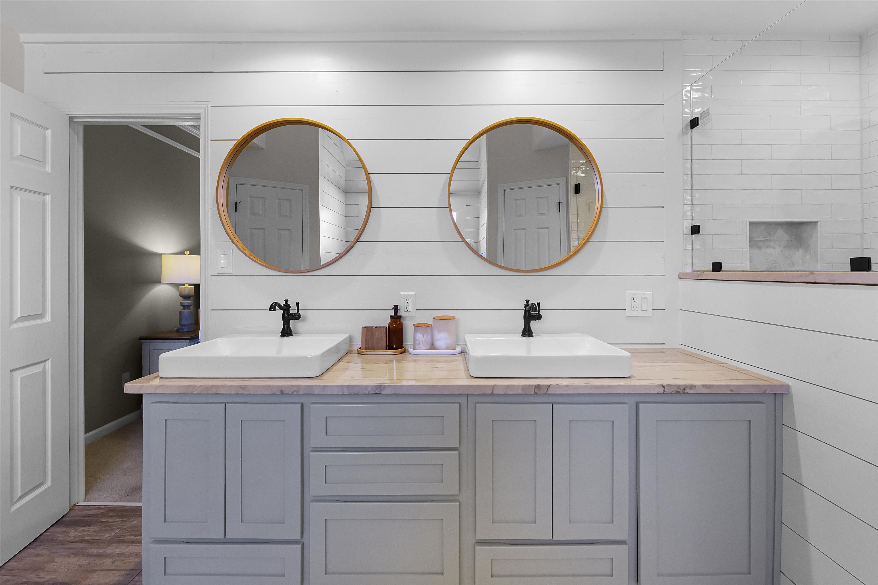 1213 Heather Ridge Cove Collierville, TN 38017 - Photo 15 of 25 a bathroom with a granite countertop double vanity sink and a mirror