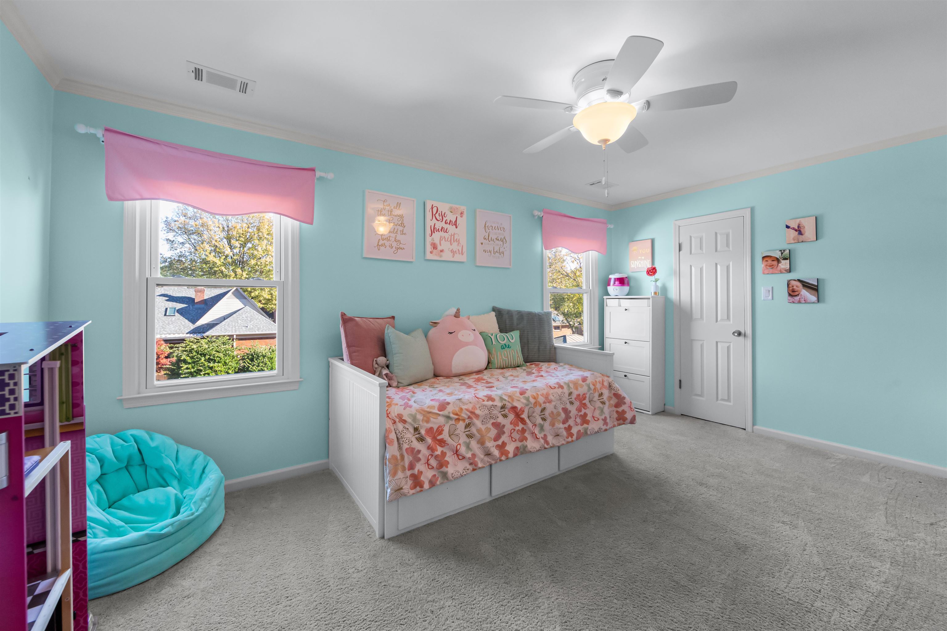 1213 Heather Ridge Cove Collierville, TN 38017 - Photo 17 of 25 a spacious bedroom with a bed and a chandelier