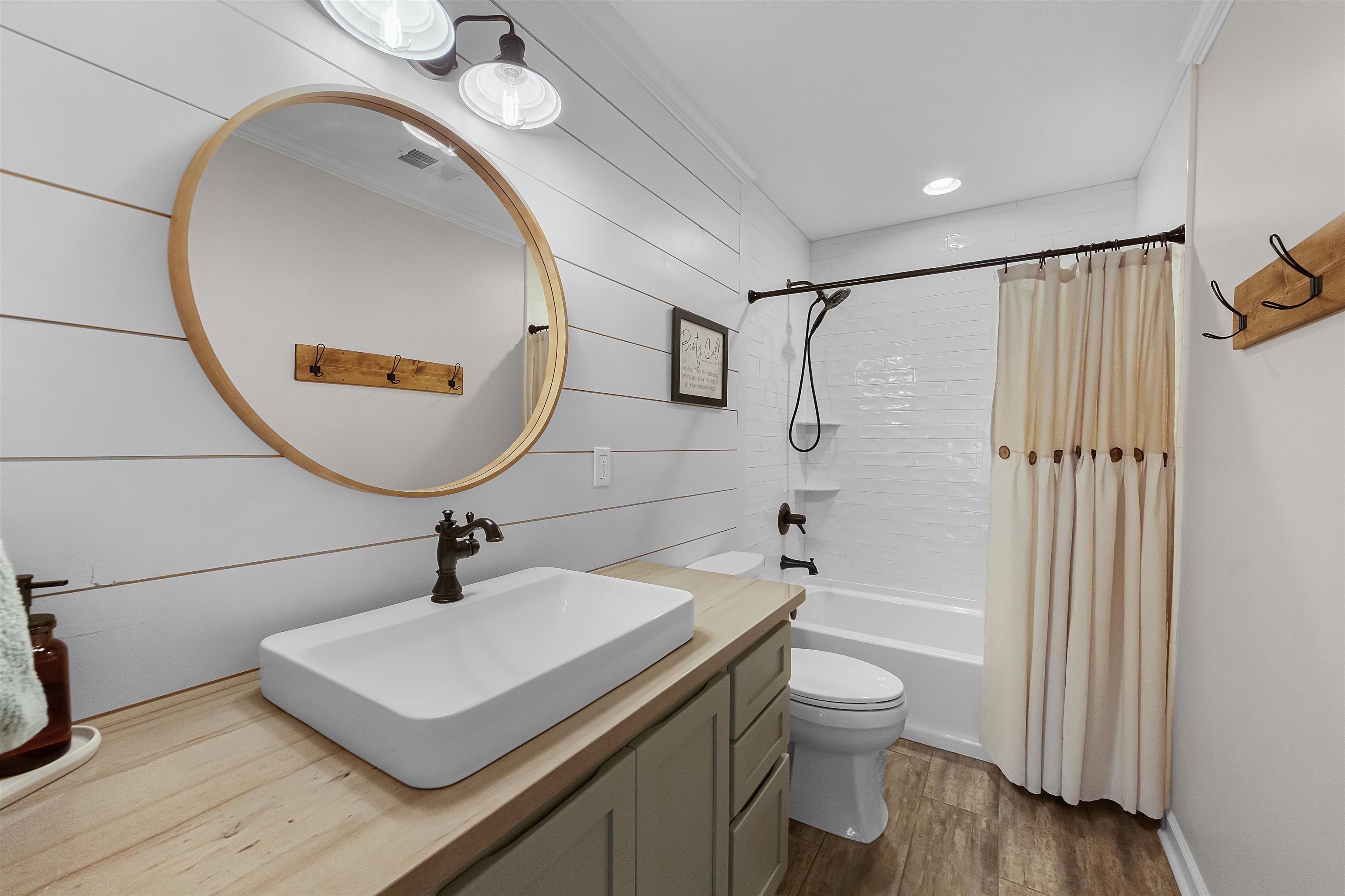 1213 Heather Ridge Cove Collierville, TN 38017 - Photo 19 of 25 a bathroom with a sink toilet a shower and a mirror