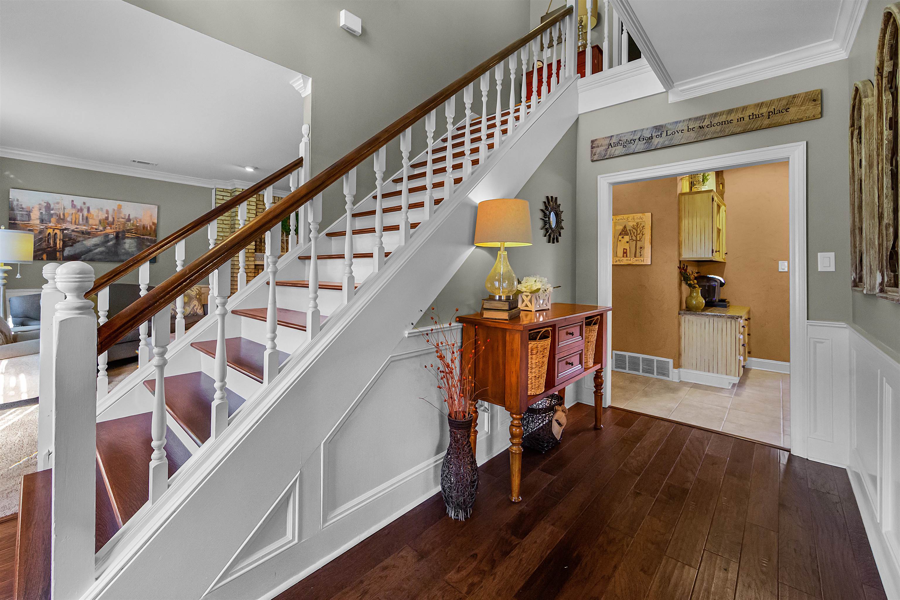 1213 Heather Ridge Cove Collierville, TN 38017 - Photo 2 of 25 a view of entryway with wooden floor and dining room