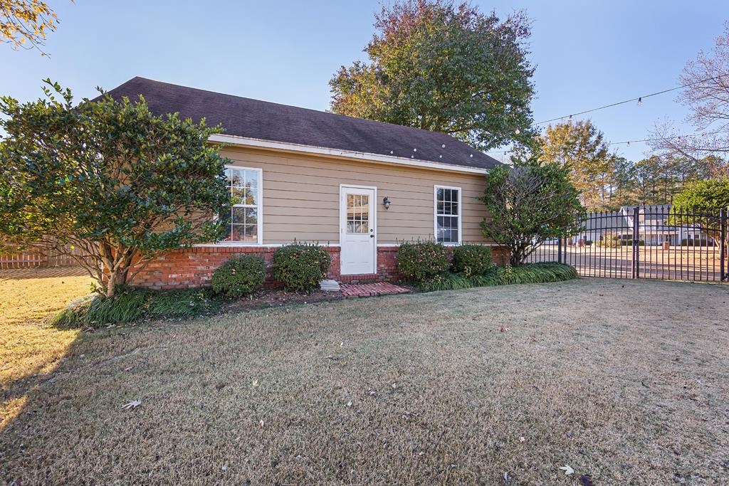 1213 Heather Ridge Cove Collierville, TN 38017 - Photo 21 of 25 a view of a house with a yard and large tree