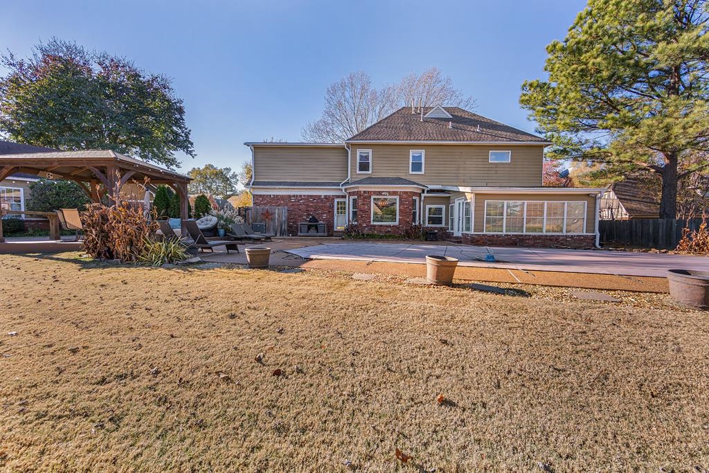 1213 Heather Ridge Cove Collierville, TN 38017 - Photo 23 of 25 a view of a house with swimming pool and sitting area