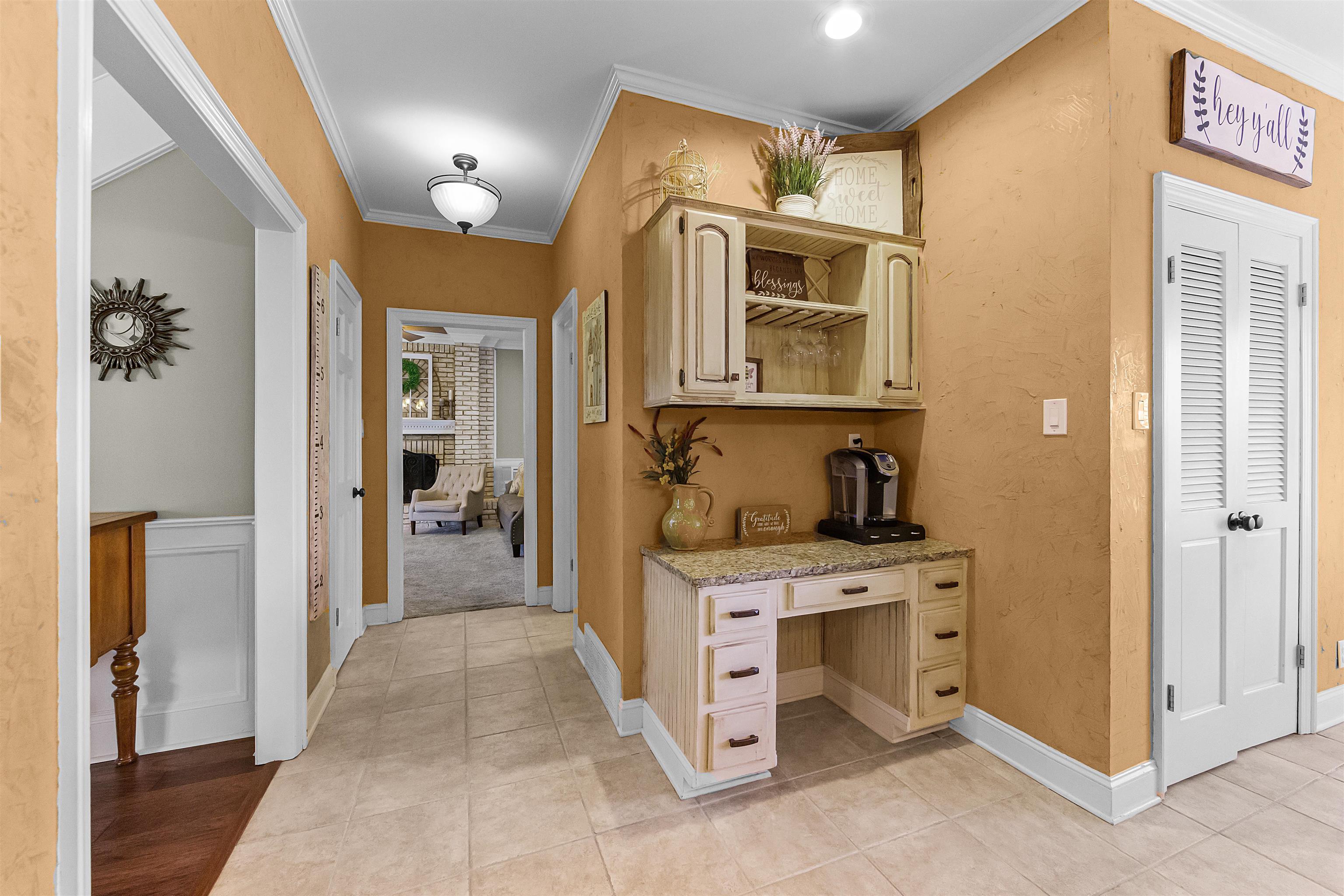 1213 Heather Ridge Cove Collierville, TN 38017 - Photo 10 of 25 a view of kitchen with a sink and refrigerator
