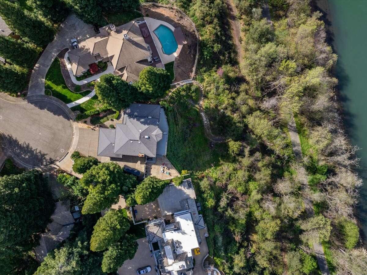 416 Arbor Place Redding, CA 96001 - Photo 1 of 31 an aerial view of a house with a yard