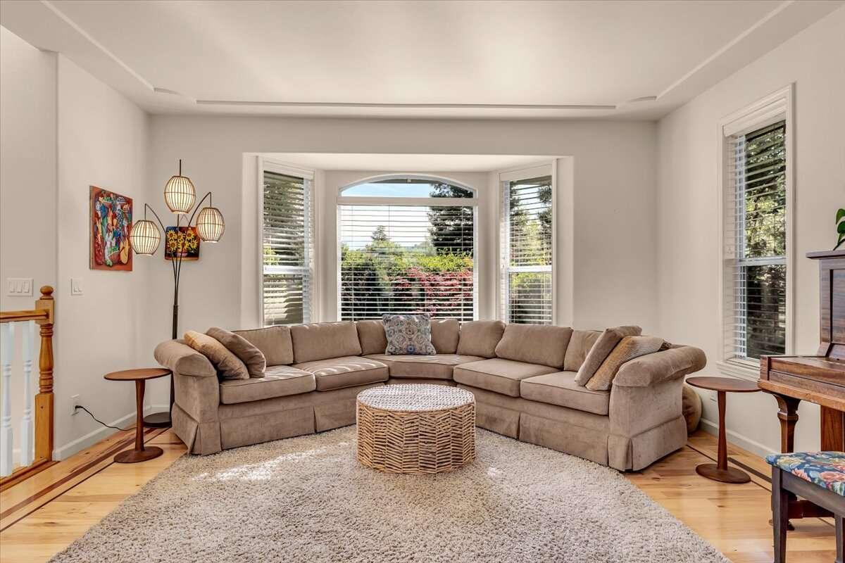 416 Arbor Place Redding, CA 96001 - Photo 4 of 31 a living room with furniture and a large window