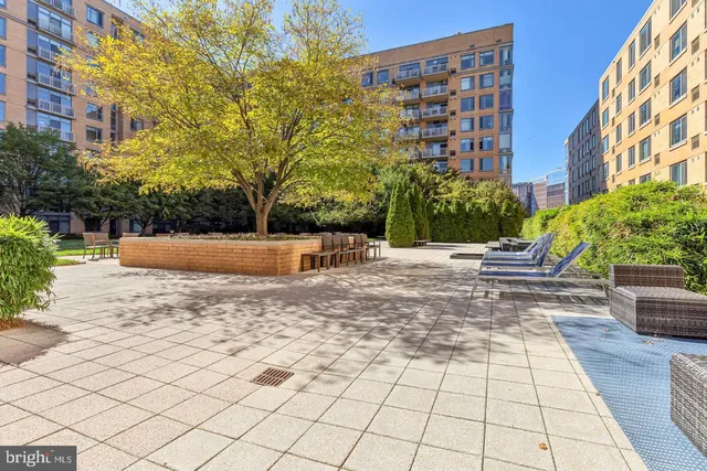 a view of a terrace and chairs