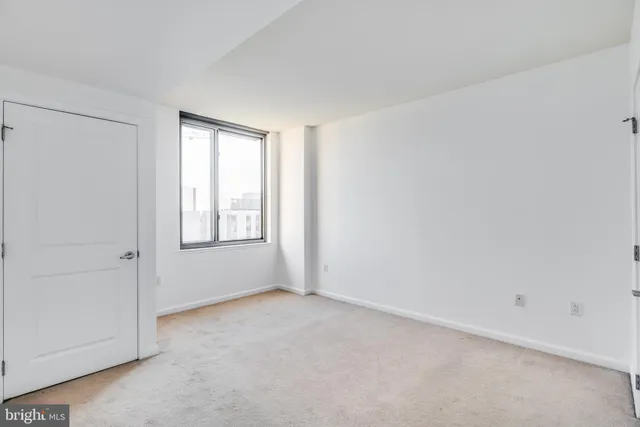 an empty room with window