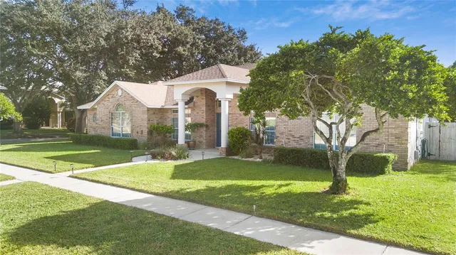 a house view with a garden space