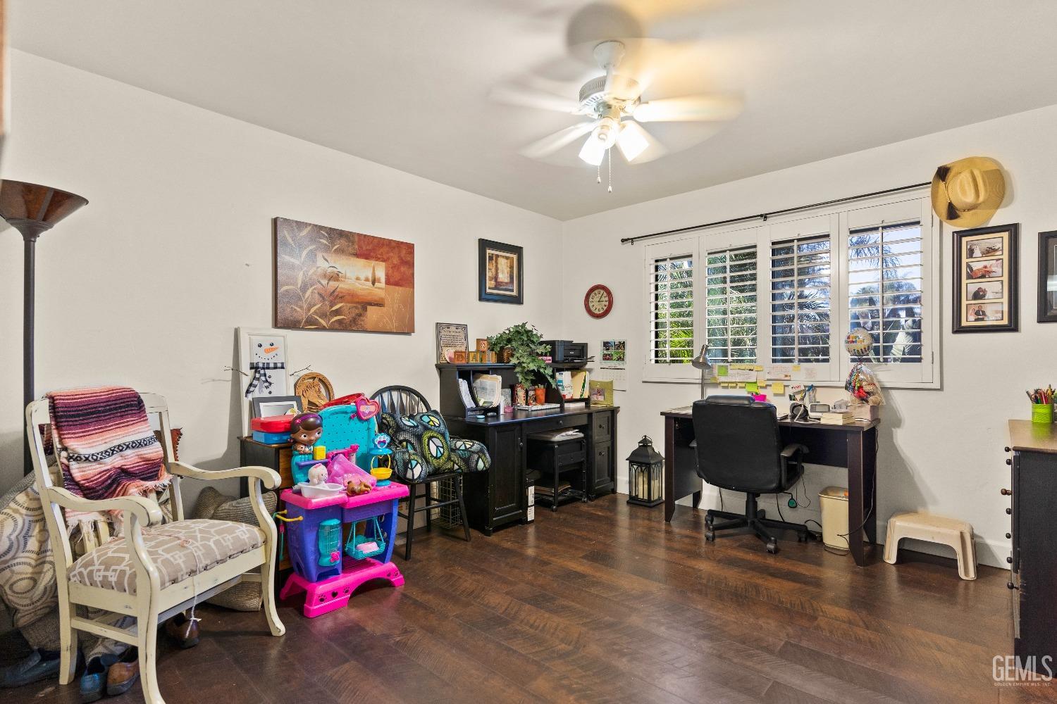 Undisclosed Address Bakersfield, CA 93309 - Photo 16 of 27 a living room with furniture and a window
