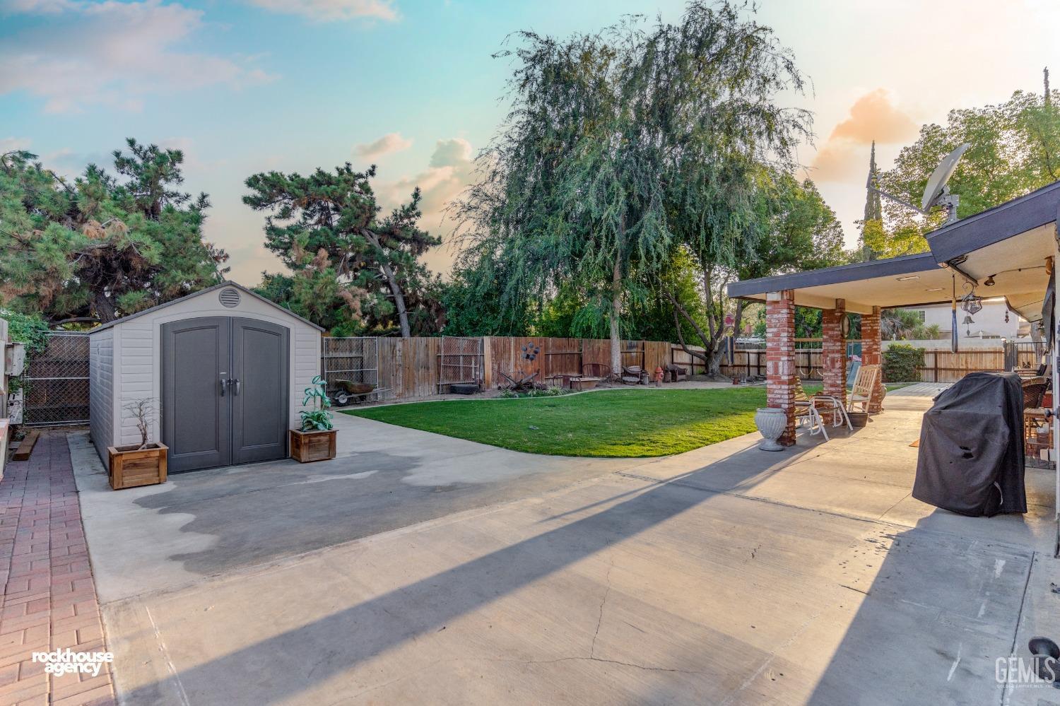 Undisclosed Address Bakersfield, CA 93309 - Photo 23 of 27 a view of a backyard with sitting area