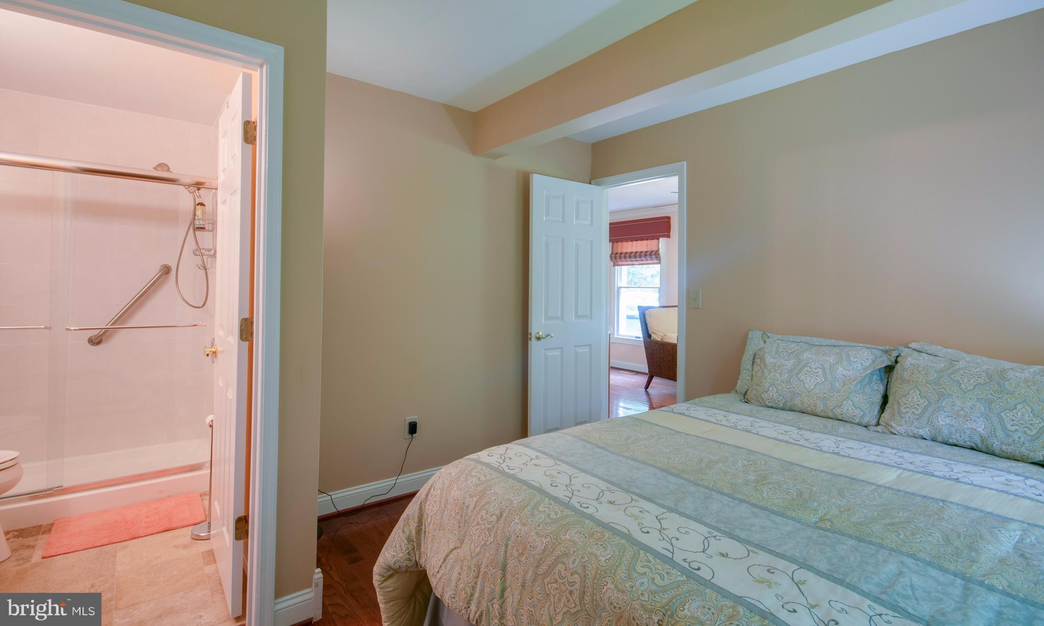 1449 Tar Point Road Pasadena, MD 21122 - Photo 10 of 30 Ensuite bedroom offers privacy for in-law suite