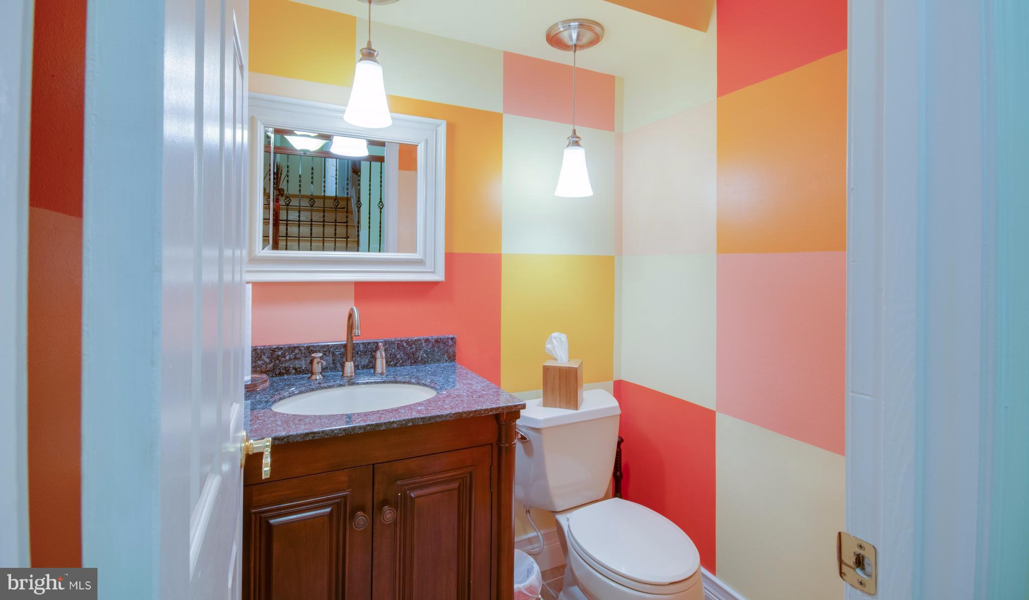 1449 Tar Point Road Pasadena, MD 21122 - Photo 12 of 30 Main level powder room off main hallway