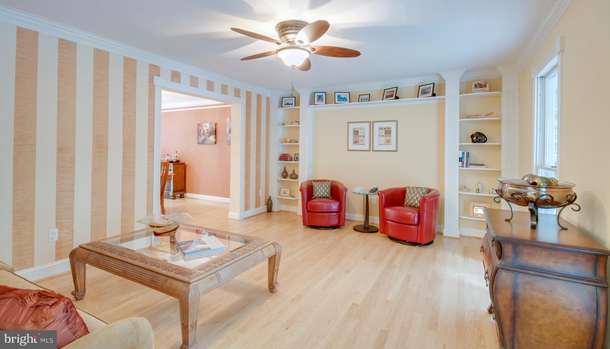 1449 Tar Point Road Pasadena, MD 21122 - Photo 13 of 30 Living Room with built-in bookcases
