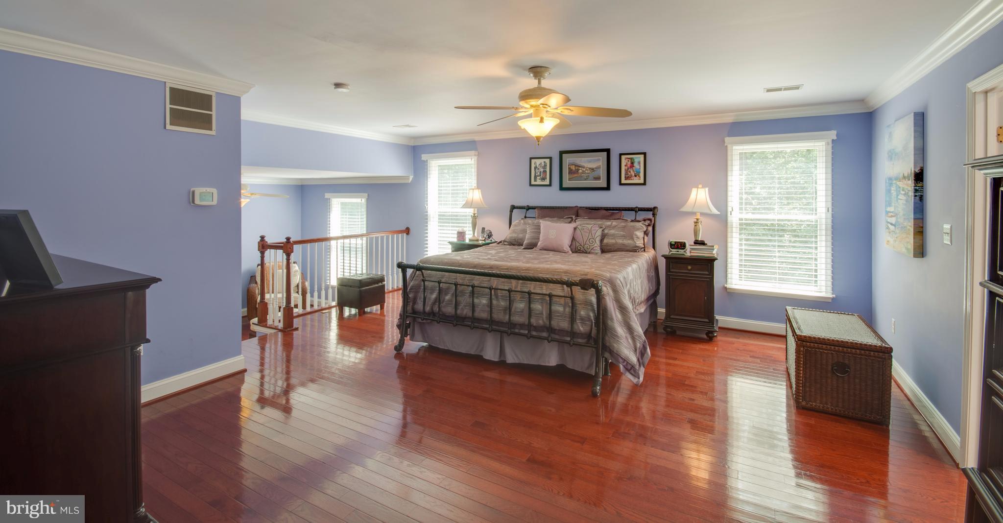1449 Tar Point Road Pasadena, MD 21122 - Photo 15 of 30 Light, open master bedroom w/hardwood floors