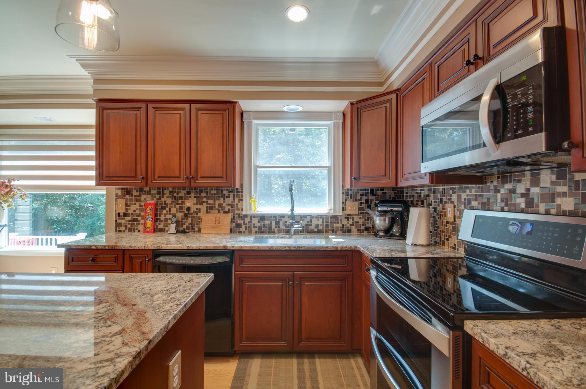 1449 Tar Point Road Pasadena, MD 21122 - Photo 5 of 30 Updated appliances, granite and backsplash