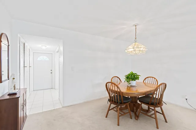a kitchen with stainless steel appliances a refrigerator sink and stove