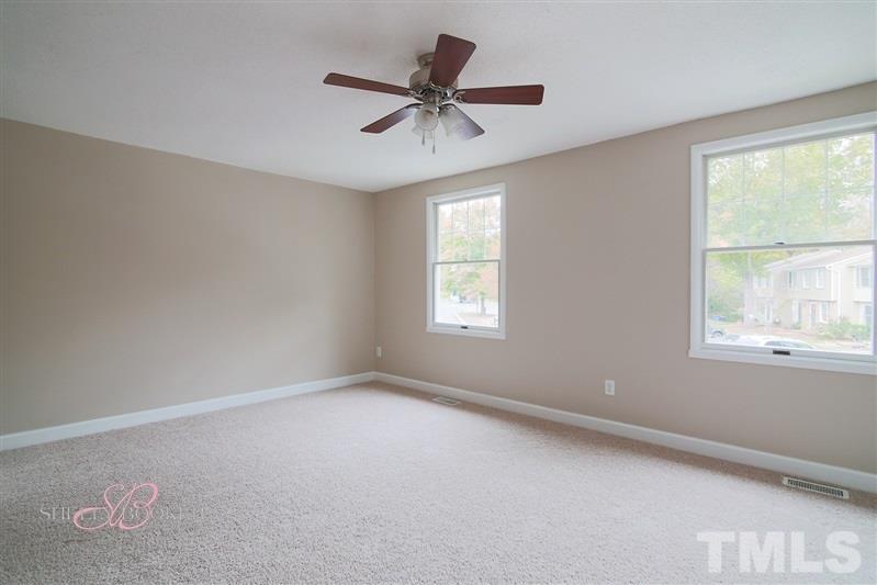 7705 Sandra Lane Raleigh, NC 27615 - Photo 12 of 12 Second bedroom is large enough for bedroom and sitting room.