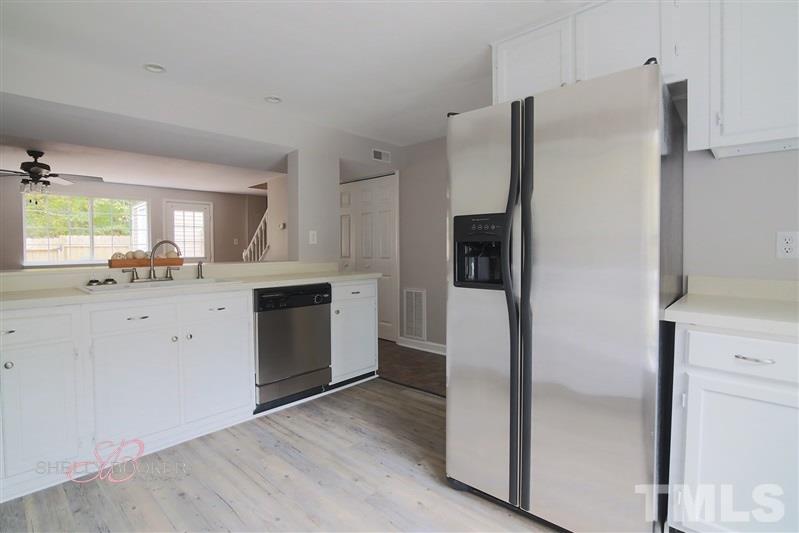 7705 Sandra Lane Raleigh, NC 27615 - Photo 5 of 12 Spacious kitchen offers lots of storage and counter space.