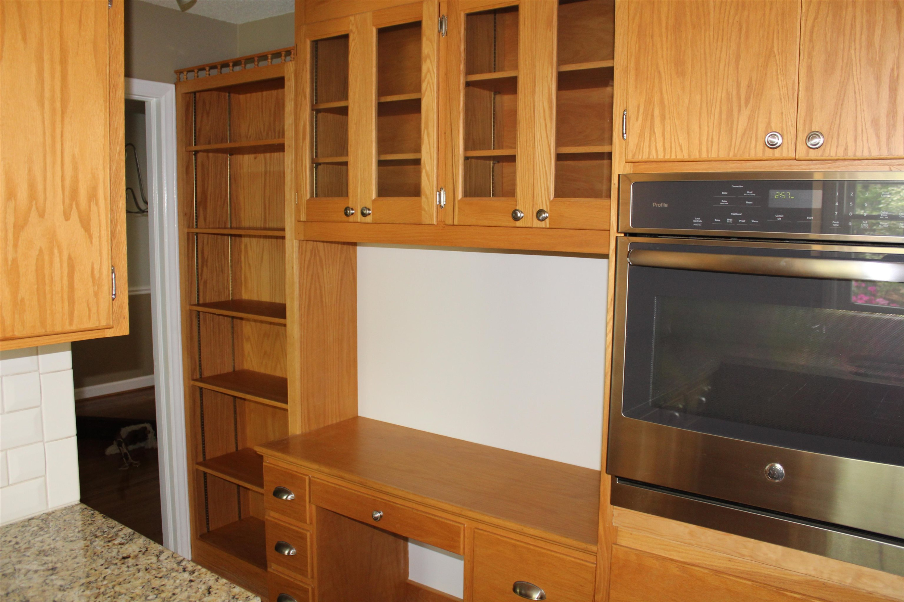 5214 Knollwood Road Raleigh, NC 27609 - Photo 10 of 23 Bookshelves and Work Space